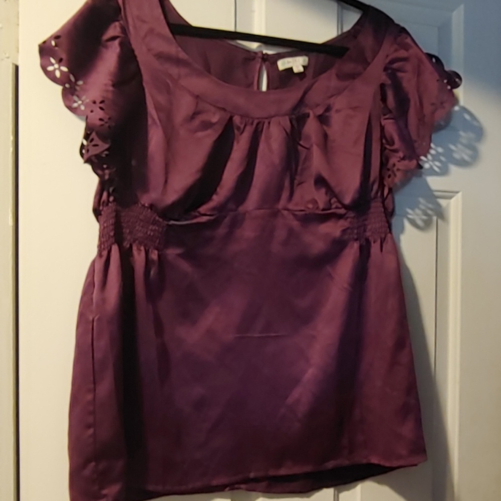 Wine colored silky top.